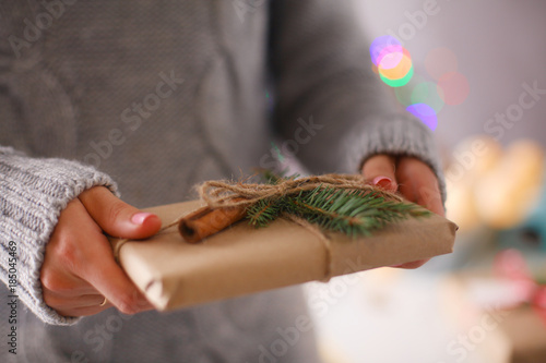 Hands of woman holding christmas gift box. Christmas