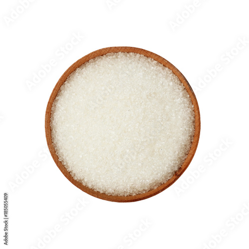 Close up wooden bowl full of white sugar isolated