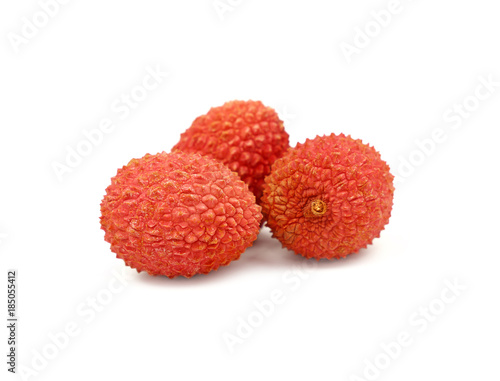 Fresh red lychee isolated close up on white