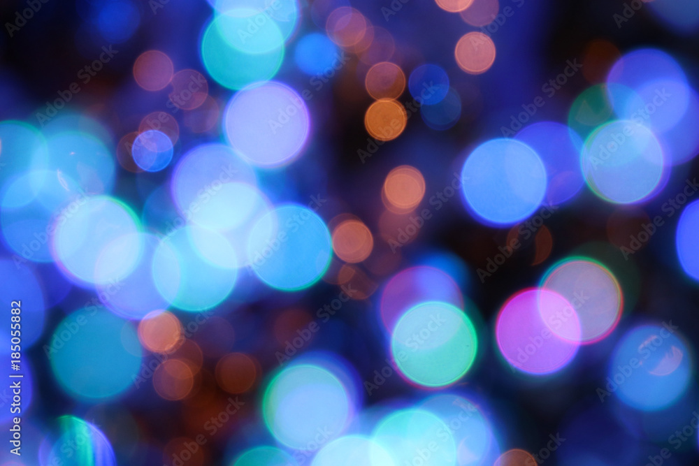 Defocused nightlights blurred background decoration in Christmas and New Year seasonal Defocused nightlights blurred background decoration in Christmas and New Year seasonal
