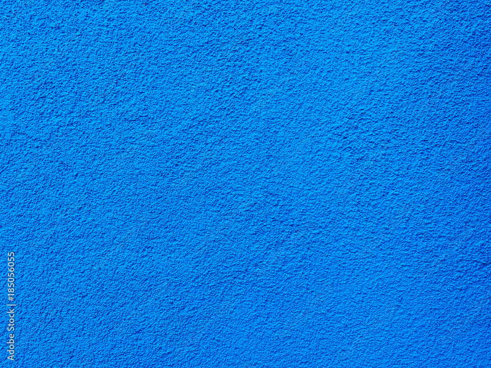 Obraz premium Blue wall texture background. Textured concrete plaster with spraying in the form of drops
