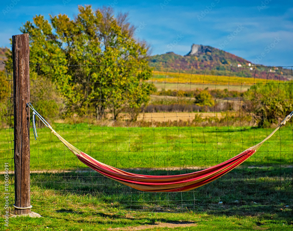 Hammock in the garden with nice mountain background Hammock in the garden with nice mountain background