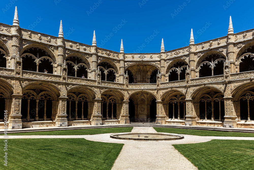 Two-storey cloisters of the Jeronimos Monastery. The monastery is one of the most prominent examples of the Portuguese Late Gothic Manueline style of architecture in Lisbon.