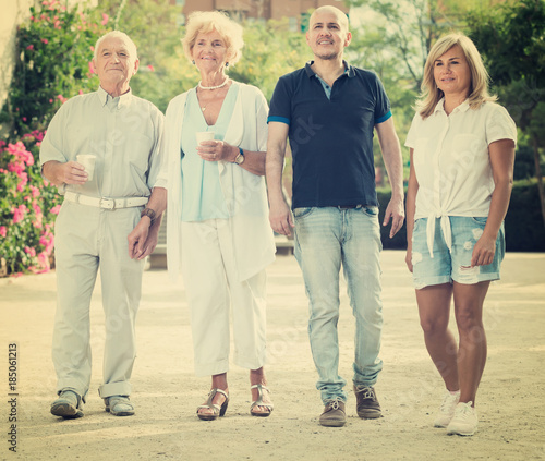 elderly friends walking outdoo © JackF