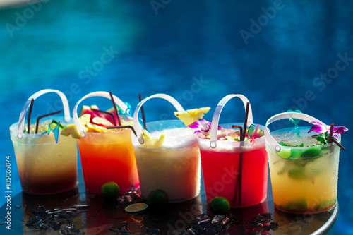 Selection of cocktail in ice bucket special drink for pool party