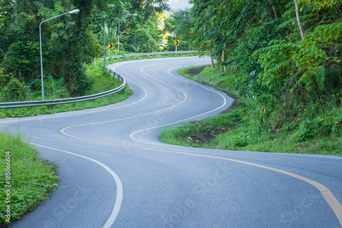 Road curves up the mountain in Thailand