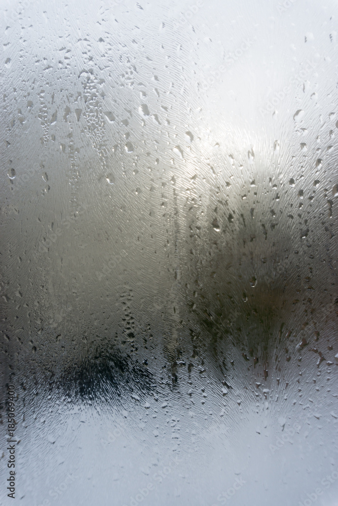 abstract drops of rain on car window abstract drops of rain on car window