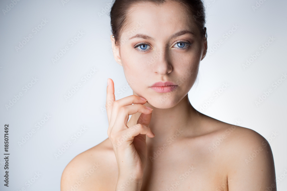 Face of a beautiful young woman with a towel Face of a beautiful young woman with a towel