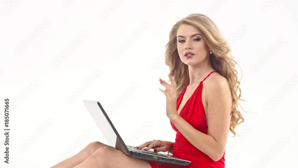 Sexy young blonde with laptop, on white background Sexy young blonde with laptop, on white background