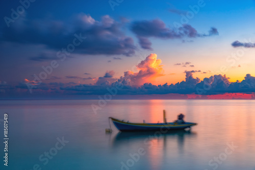 Calm sunrise over ocean on Maldives