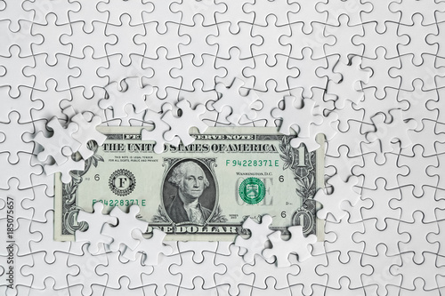 Wallpaper Mural Missing jigsaw puzzle pieces on money dollar background, Business solution concept ,key for success Torontodigital.ca