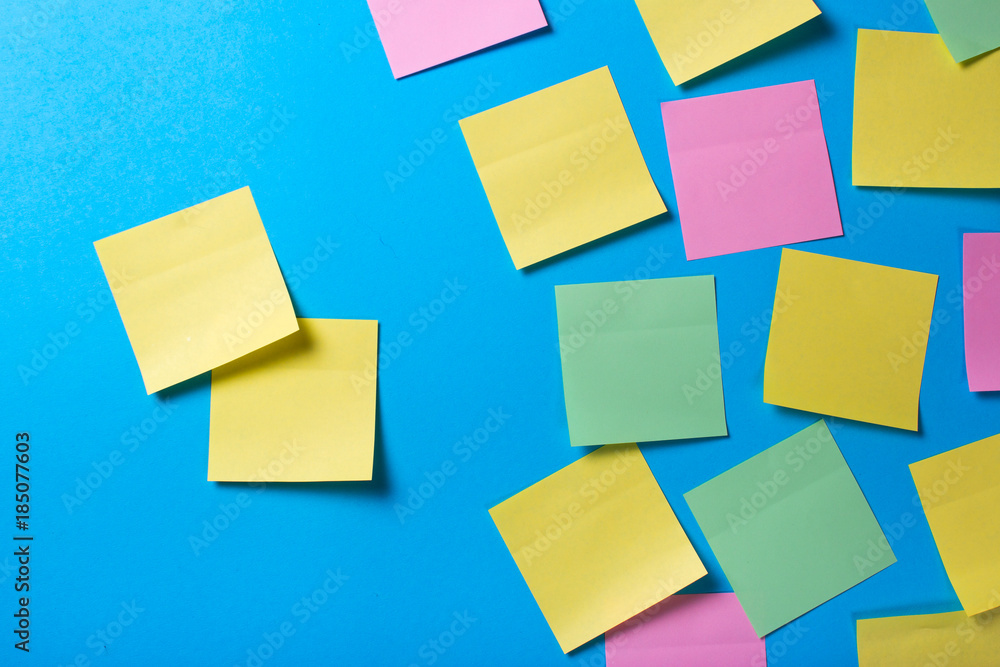 Mock-up many colored empty office stickers on a blue background and two separately Mock-up many colored empty office stickers on a blue background and two separately