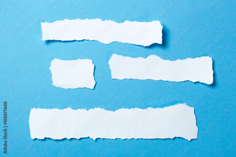 Pieces of white paper template for text on a blue background. Mock-up