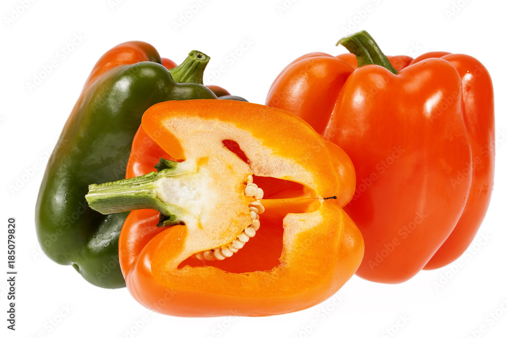 Vegetables of orange and green pepper isolated on white background. Vegetables of orange and green pepper isolated on white background.