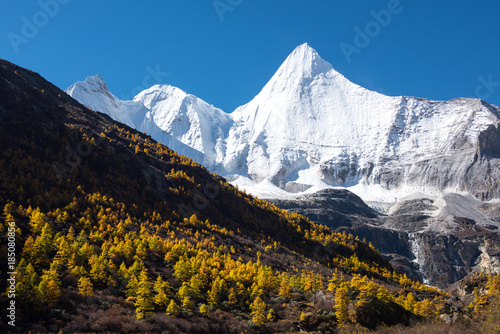 Yangmaiyong snow mountain of Aden scenic spot,Sichuan province,China photo