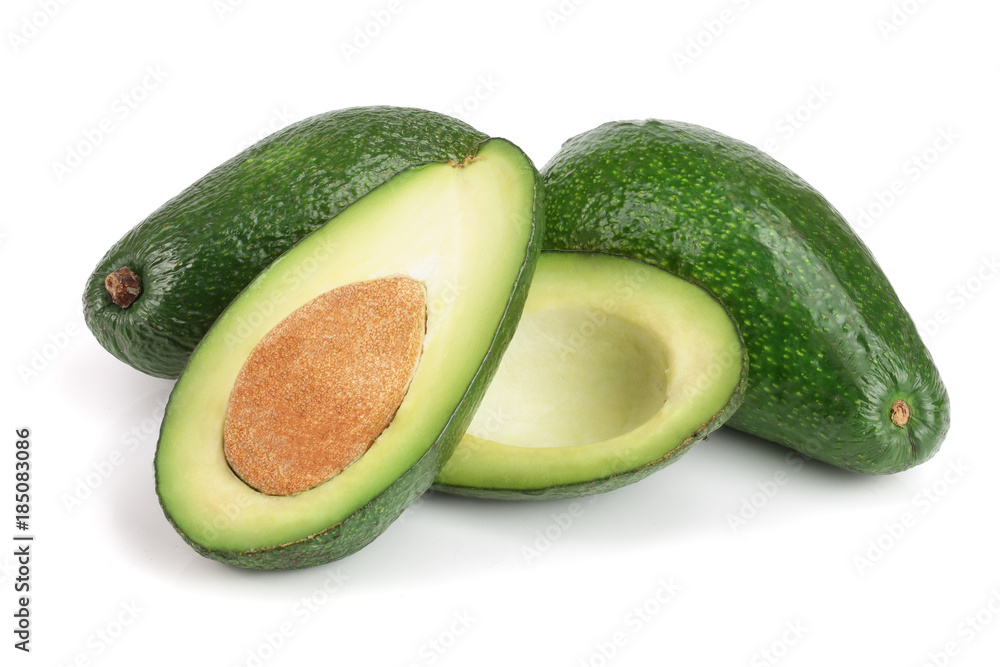 whole and half avocado isolated on white background close-up. Top view whole and half avocado isolated on white background close-up. Top view