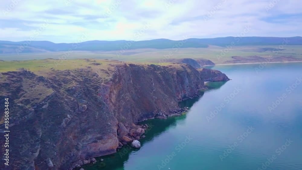 ProRes. Baikal lake shore and rocks from aerial view. Landscape. ProRes. Baikal lake shore and rocks from aerial view. Landscape.