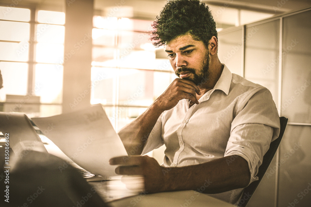 Business person in office. Business person in office.