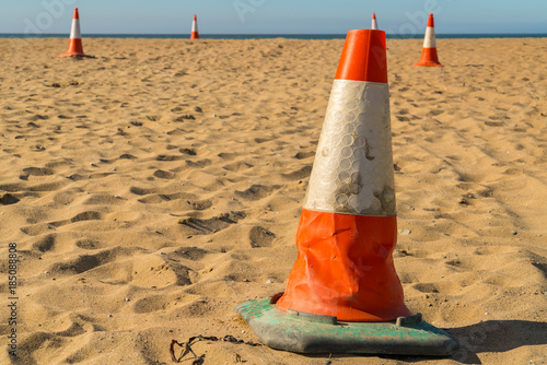 Pylons on the beach, seen in Aberporth Bay, Ceredigion, Dyfed, Wales, UK photo