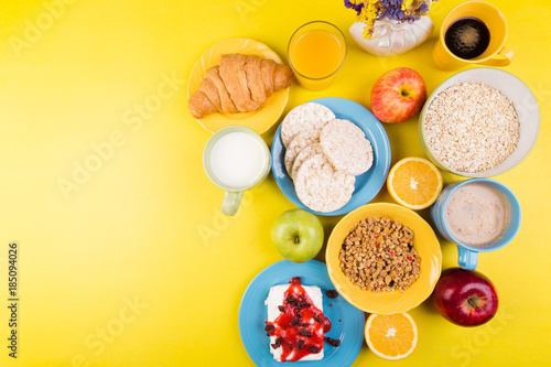 Healthy Breakfast. Various Assortment Set. Orange Juice, Granola, Croissant, Coffee and Fruit.