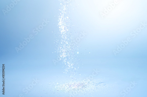silver dust glitter on a blue background