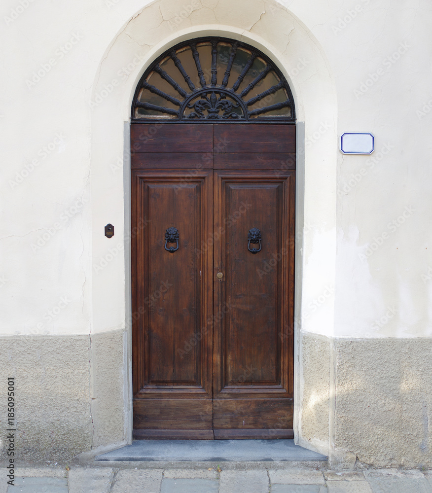 ancient wooden door of historic building