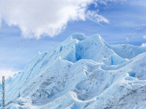 Blue ice background texture. Perito Moreno clear blue glacier close up in Los Glaciares National Park, Patagonia, Argentina, South America. Blue iceberg with Ice caves.