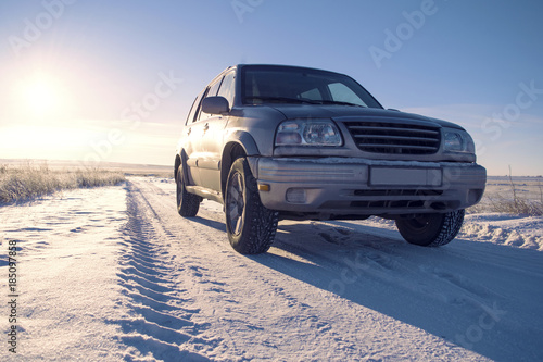 SUV on winter horizon. © Stanislav