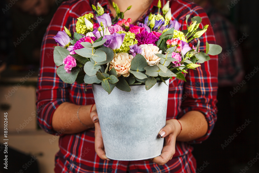 custom made wallpaper toronto digitalfemale hands holding a floral bouquet in a bucket