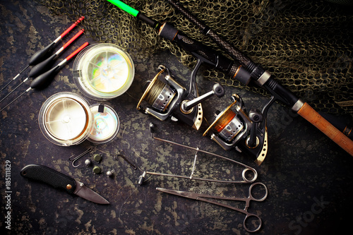 Accessories for sport fishing on the old background