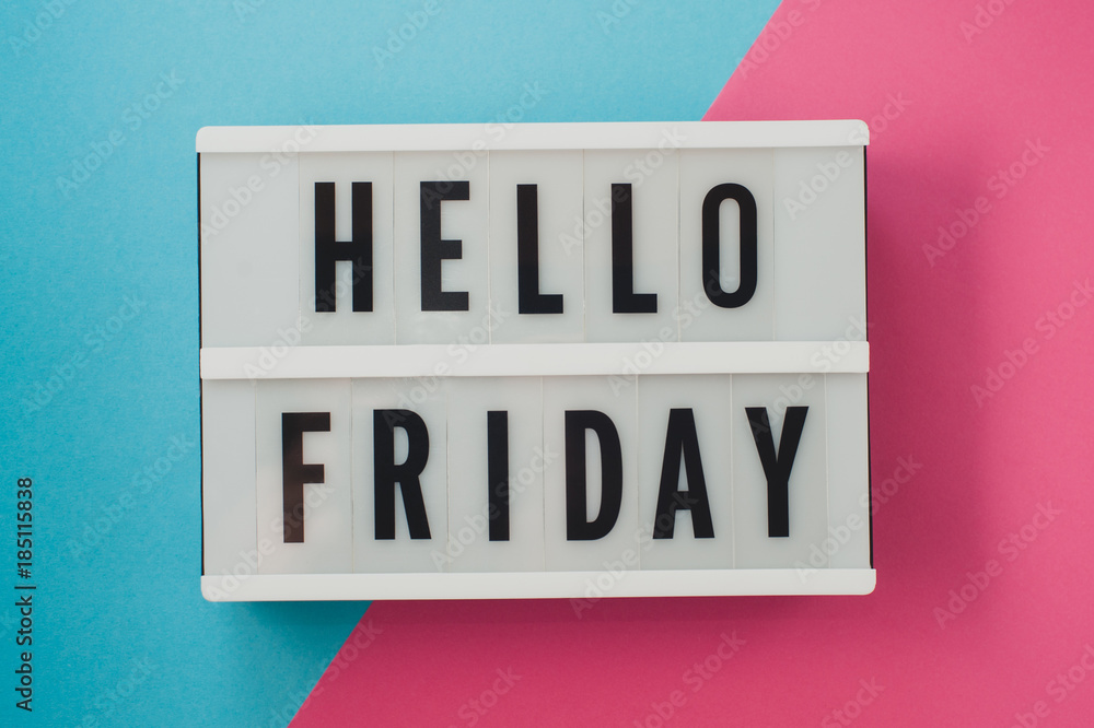 Hello Friday- text on a display on blue and pink bright background. - obrazy, fototapety, plakaty 