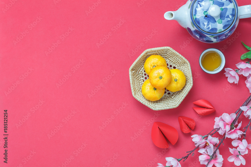 Flat lay image of items decoration & ornaments for Chinese new year and lunar holiday background concept.Difference essential accessory on the red wallpaper.object for mock up and template design.