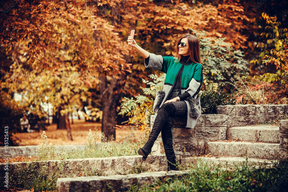 Fototapeta premium Woman taking selfie