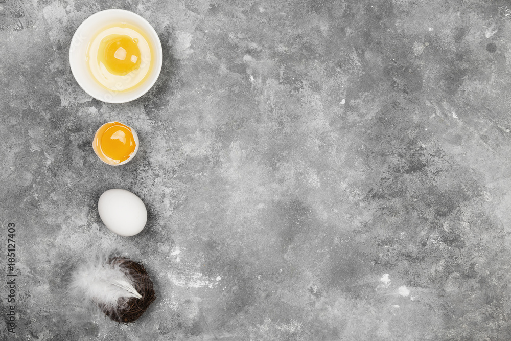 Eggs on a gray background. Top view. Food background Eggs on a gray background. Top view. Food background