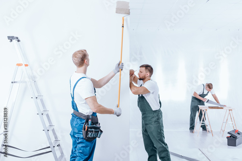 Home renovation crew finishing interior photo
