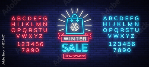 Winter sale of a poster in neon style. Neon sign, bright flyer, glowing banner, night neon advertising on the theme of winter holiday discounts and sales. Vector illustration. Editing text neon sign