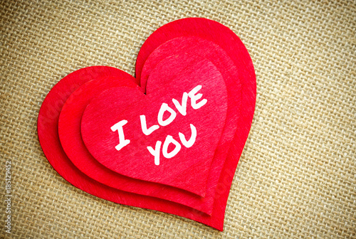 Heart with I love you word isolated on a burlap fabric. Valentines Day and love concept