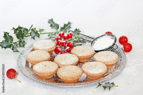 Festive mince pies on silver platter 