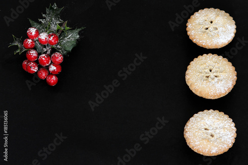 Christmas mince pies on black board 