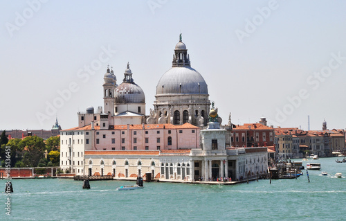panoramic view of Venice from the height of the cruise ship to Piazza San Marco and the Ducale, or Doge's Palace. on the Grand canal many boats, river transport, in the background of ancient architect © ESENIY