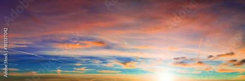 Panorama of sunrise / sunset sky with orange clouds
