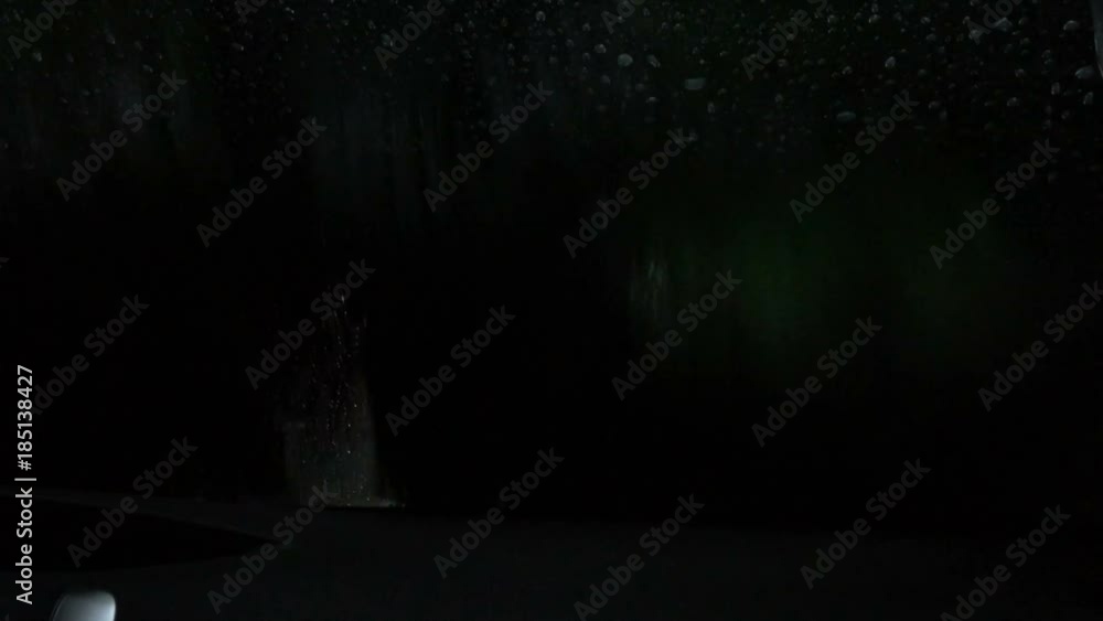 Inside view of car during washing process. Inside view of car during washing process.