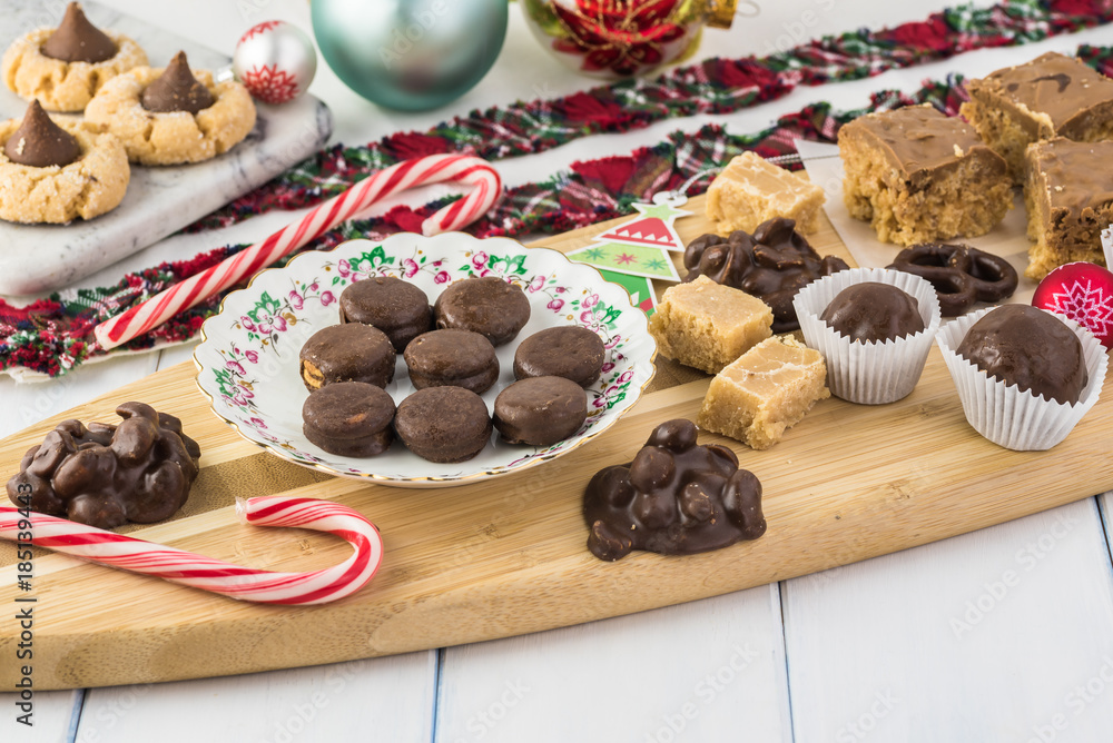 Fototapeta premium Homemade chocolate candies and cookies for Christmas party table.