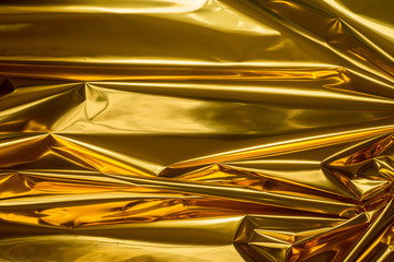 golden folded metallic foil abstract bacgkground