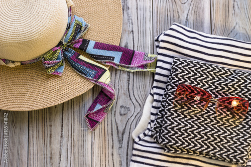 Travelling accessories on a wooden background