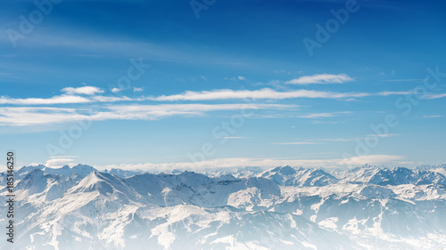 alps mountains landscape on blue gradient cloudy sky background