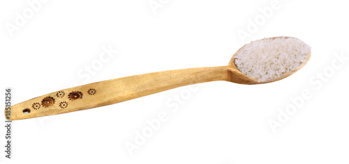 wooden spoon with rice photo