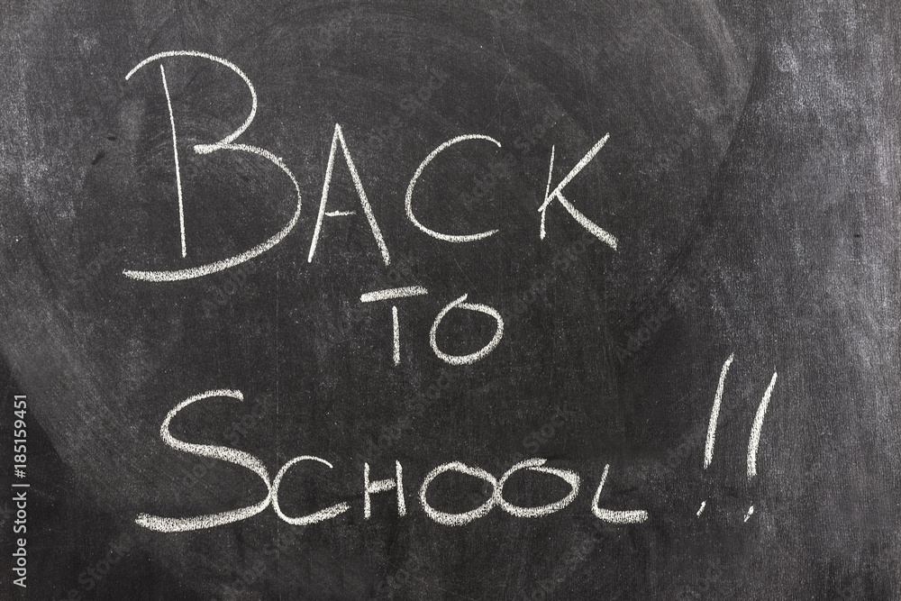Back to School written on blackboard Back to School written on blackboard