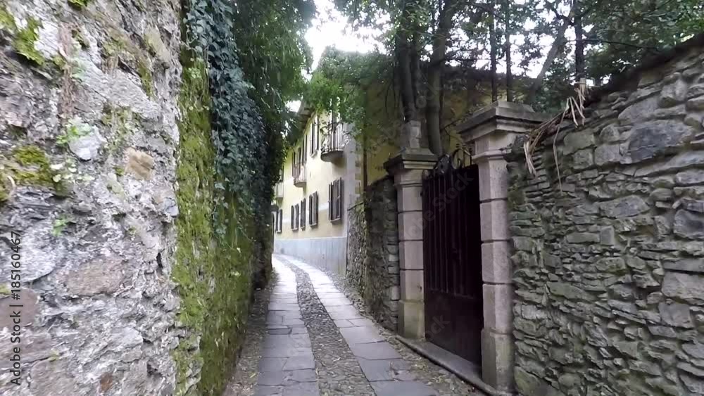 Narrow ancient italian street on Isola San Giulio Narrow ancient italian street on Isola San Giulio