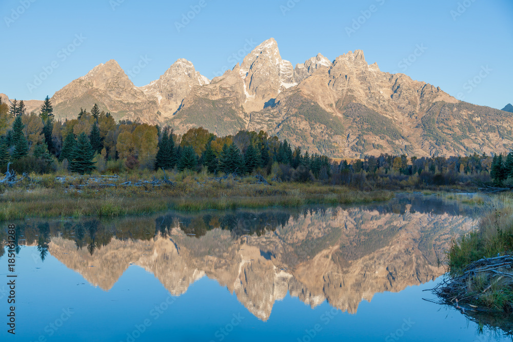 Scenic Autumn Reflection in the Tetons at Sunrise
